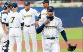  ?? GREGG SLABODA — TRENTONIAN PHOTO ?? Yankees closer Aroldis Chapman walks off the mound after pitching for the Thunder against Erie on Friday.