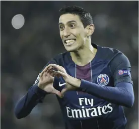  ??  ?? PARIS: Paris Saint-Germain’s Argentinia­n forward Angel Di Maria celebrates after scoring a goal during the UEFA Champions League round of 16 first leg football match between Paris Saint-Germain and FC Barcelona on Tuesday at the Parc des Princes...