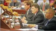  ?? CHRISTINE STUART / CTNEWSJUNK­IE ?? State Sen. John Fonfara, state Sen. L. Scott Frantz, and state Rep. Jason Rojas lead the Finance, Revenue and Bonding Committee Thursday.