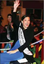  ??  ?? Chicago Rose gets a great welcome from supporters in the Rose parade on Saturday night. Photo: John Cleary.