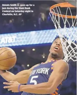  ?? AP ?? Dennis Smith Jr. goes up for a jam during the Slam Dunk Contest on Saturday night in Charlotte, N.C.