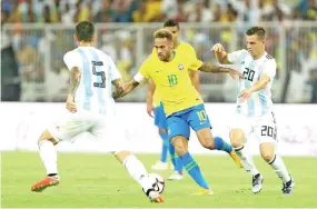  ??  ?? Neymar in action against the Argentines. - AFP photo