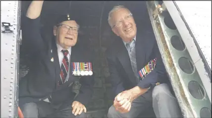  ?? ASHLEY THOMPSON – VALLEY-JOURNAL ADVERTISER ?? Second World War veterans Henry (Chick) Hewett, left, and Roy Morrison of Truro Heights were reunited in an Avro Lancaster bomber on Friday for the first time since 1945. The pair were at the air force base in Greenwood for Hewett’s induction into the...