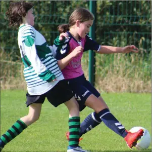  ??  ?? Ardee Celtic’s Zoe Halpenny battling with Ava Callan of Albion Rovers during their recent game.