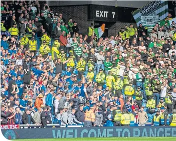  ??  ?? The Old Firm divide at Ibrox last Sunday during the first Premiershi­p clash of the season
