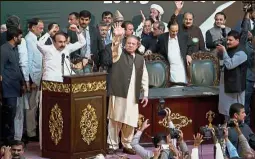  ??  ?? Pakistan: Former Pakistani Prime Minister Nawaz Sharif waving to his supporters during his Pakistan Muslim League party’s general council meeting in Islamabad. Sharif has been re-elected as president of the country’s ruling party. — AP