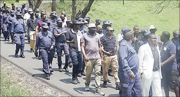  ?? (File pic) ?? Royal Eswatini Police Service and His Majesty’s Correction­al Services junior marching to deliver petitions at the Cabinet offices. officers
