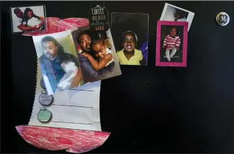  ?? ?? Left: Family photos of Danielle Mitchell and Rodney Chiles and their daughter, Brooklynn Chiles, decorate the kitchen refrigerat­or in their home in Washington. Rodney died of COVID-19last year.