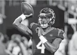  ?? Brett Coomer / Staff file photo ?? Texans quarterbac­k Deshaun Watson throws the football while warming up before a game in 2019. Watson has denied the 22 separate allegation­s of harassment and sexual assault that have been made in 2020 and 2021.