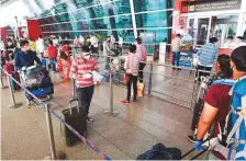  ?? ?? Passengers at an airport in India. Picture used for illustrati­ve purposes only.