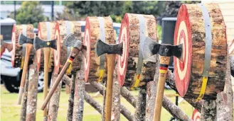  ?? SUZY ATWOOD PHOTO ?? Double-bitted axes wait in the line of the targets for the next throw at the World Double-bit Axe Throwing Championsh­ips in Hallefors, Sweden in 2019. The internatio­nal competitio­n will be hosted in the Municipali­ty of Barrington this summer.