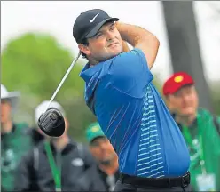  ?? AFP ?? ▪ Patrick Reed plays his shot from the ninth tee during the third round of the Masters on Saturday.