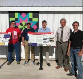  ?? PILOT NEWS GROUP PHOTO / JAMIE FLEURY ?? Shown in photo from left to right: Roger Terry of the Bourbon Street Department, Jeff Blair of the Lincoln Highway Associatio­n, Bourbon Town Council President Ward Byers, Bourbon Town Council member Terry Clemens, and Historian Kurt Garner.