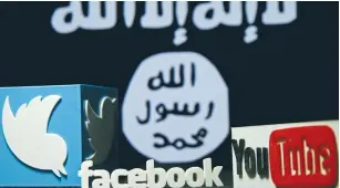  ?? (Dado Ruvic/Reuters) ?? 3D PLASTIC representa­tions of the Twitter, Facebook and YouTube logos are seen in front of an ISIS flag in this photo illustrati­on.