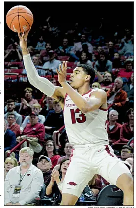  ?? NWA Democrat-Gazette/CHARLIE KAIJO ?? Sophomore guard Mason Jones has had an up-and-down year in his first season at Arkansas after transferri­ng from Connors (Okla.) State College. “I harp on myself a lot, because I know I can be better and I know I can be more consistent,” he said.