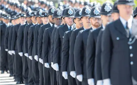  ??  ?? IT’S A COP-OUT: Police numbers in the United Kingdom have fallen dramatical­ly since 2010 due to budget cuts