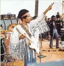  ?? MCA ?? Jimi Hendrix at Woodstock.