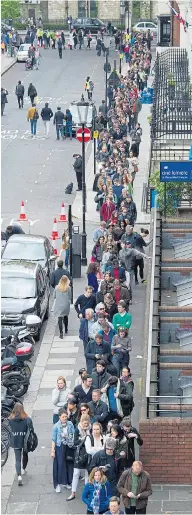  ??  ?? French expats queue to vote in London yesterday