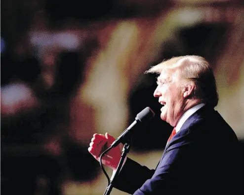  ?? MARK MAKELA / GETTY IMAGES ?? Republican presidenti­al hopeful Donald Trump speaks at a rally Harrisburg, Pa. ahead of Tuesday’s Pennsylvan­ia primary. The Canadian immigratio­n system is one that Trump would love, F. H. Buckley writes.