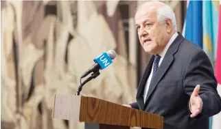  ??  ?? Riyad Mansour, Palestinia­n ambassador to the UN, speaks to reporters outside the UN Security Council chambers in New York Monday. (AP)