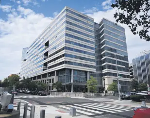  ??  ?? The street corner between the World Bank headquarte­rs and the Internatio­nal Monetary Fund (IMF) building is seen in Washington, D.C., Oct. 1, 2020.