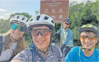  ?? ?? THE cycling family on top of Rooiberg Pass.