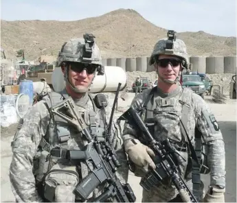  ?? PROVIDED ?? Then- Lt. Jim Rudisill ( left) and Capt. Christophe­r Boyd in 2010 in Khost Province, Afghanista­n.