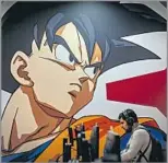  ?? Paco Freire SOPA Images / LightRocke­t via Getty Images ?? WORK GOES BIG
His manga was adapted into anime. A “Dragon Ball Z” graphic at a gaming festival in Spain.