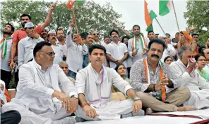  ??  ?? EAR TO THE GROUND
Rajasthan Congress chief Sachin Pilot at an election meeting