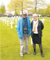  ?? FOTODESIGN MONIEK WEGDAM ?? Huub Schepers and author Mieke Kirkels at the Netherland­s American Cemetery at Margraten in 2015. Kirkels, a public historian in the Netherland­s, has written several books about the experience of African American soldiers during WWII. Kirkels published a book about an African American gravedigge­r in 2014 and Schepers read it. He never knew his father or why he looked“different,”but realized after reading Kirkels’ book that his father must have been one of the soldiers.