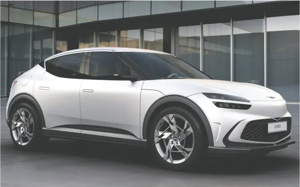  ?? GENESIS ?? The 2022 Genesis GV60 features a grille set wide and low on the front fascia, which will help make battery cooling more efficient, the automaker says.