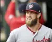  ?? NICK WASS — THE ASSOCIATED PRESS ?? Nationals outfielder Bryce Harper smiles in the dugout before a game against the Orioles last season.