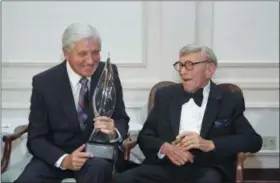  ?? JULIE MARKES — THE ASSOCIATED PRESS FILE ?? In this file photo, Monty Hall, left, recipient of the 2nd Annual George Burns Lifetime Award, laughs with George Burns at the United Jewish Fund tribute to humanitari­an Hall, in the Century City section of Los Angeles. Former “Let’s Make a Deal” host...