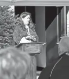  ?? JULIE VENNITTI BOTOS/CANTON REPOSITORY ?? Kristine Stanley, assistant director of Veterans Services of Family & Community Services Inc., speaks Tuesday at the grand opening celebratio­n for Honor Home Charlie in Canton, a transition­al home for female veterans and children.