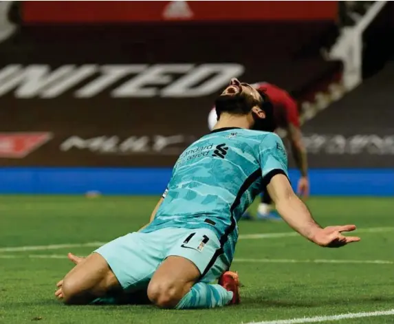  ?? (Getty) ?? Mohamed Salah celebrates after scoring against Manchester United