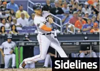  ?? ASSOCIATED PRESS FILE PHOTO ?? A person familiar with the negotiatio­ns says the New York Yankees and Miami Marlins are working on a trade that would send slugger Giancarlo Stanton to New York and infielder Starlin Castro to Miami.