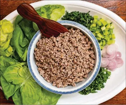  ??  ?? With some adjustment­s to the Lao salad known as larb, you can make a keto-friendly recipe such as Keto Pork Larb Lettuce Cups.