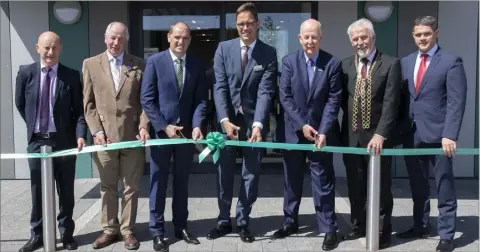  ??  ?? Cutting the ribbon to mark the official opening of the B/Braun Wellstone Wexford Renal Care Centre at Sinnottsto­wn Lane (from left): Cllr Frank Staples; Liam Butler; Irish Kidney Associatio­n; Minister of State, Paul Kehoe; Markus Strotmann; Leo...