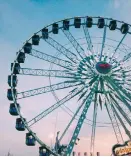  ??  ?? Larissa Medina The carnival features a Texassize Ferris wheel.