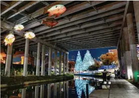  ?? Billy Calzada/staff file photo ?? The F.I.S.H. installati­on was created by Philadelph­ia artist Donald Lipski and installed in 2009 when the Museum Reach portion of the River Walk opened.