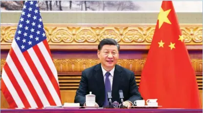  ?? HUANG JINGWEN / XINHUA ?? Chinese President Xi Jinping speaks with US President Joe Biden via video link from Beijing on Nov 16.