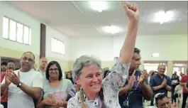  ??  ?? Give the man a hand: Ms Pauline Stanford, a former trade unionist, raises an arm at a meeting in support of Finance Minister Pravin Gordhan which was held by the Active Citizen movement on Sunday in Asherville.