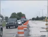  ?? MACOMB DAILY FILE PHOTO ?? Motorists navigate through constructi­on barrels restrictin­g traffic to one lane on northbound Mound Road in Sterling Heights in 2018. Work on Mound Road will be one of the county’s biggest projects in the coming year