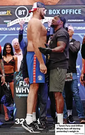  ?? Julian Finney ?? Tyson Fury and Dillian Whyte face-off during yesterday’s weigh-in