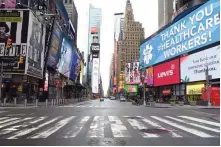  ??  ?? New York’s Times Square, virtually empty here at the height of the coronaviru­s pandemic, is opening its doors to profession­al sports, says Gov. Andrew Cuomo. (AFP)