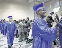  ?? Associated Press file photo ?? Inmates graduate from an entreprene­urship program. Their success depends on their treatment by the business community.