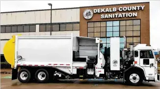  ?? CONTRIBUTE­D ?? DeKalb County’s new, $340,000 automated side loader garbage trucks are considered more efficient and cost-effective than older ones, but 23 of the trucks sit idle for lack of qualified drivers.