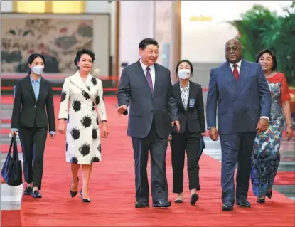  ?? FENG YONGBIN / CHINA DAILY ?? President Xi Jinping and his wife Peng Liyuan welcome visiting President of the Democratic Republic of the Congo Felix Tshisekedi and his wife Denise Nyakeru Tshisekedi at the Great Hall of the People in Beijing on May 26.