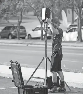  ??  ?? A crew member works on the set of the Oklahoma movie “Out of Exile.” Some Oklahoma CARES Act funds were funneled into job training and recovery programs for the film and music industries. DOUG HOKE/THE OKLAHOMAN FILE