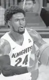  ?? JOHN RAOUX/ AP ?? UCF guard Dre Fuller Jr. had a career-high 11 rebounds, plus 7 points during the Knights’ AAC quarterfin­al loss to Memphis.